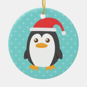Söt liten pingvin med jultomtehatt för jul julgransprydnad keramik