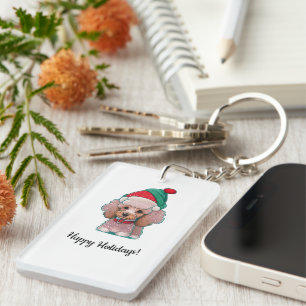 Söt liten pudel med julhatt