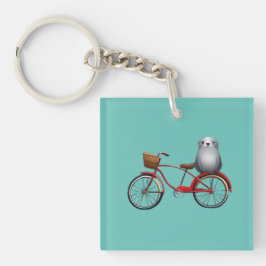 Söt liten tecknad säl på en cykel
