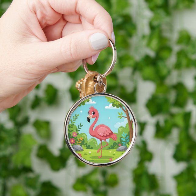 Söt ljusrosa flamingo i trädgården rund silverfärgad nyckelring (Hand)