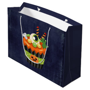 Söt och kuslig Halloween-cupcake med ett stort ögo