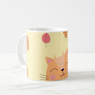 Söt orange katt leker i höstlöv kaffemugg