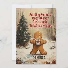 Söt pepparkaksgubbe dricker varm choklad julkort