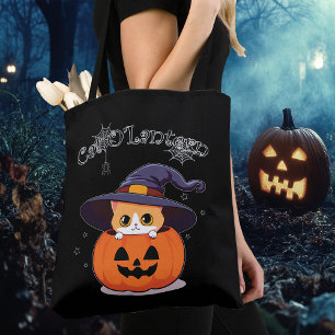 Söt rödhårig katt häxa i halloween-jack-o-lanterne tygkasse
