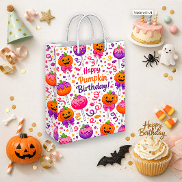 Söt rosa halloweenpumpakaka-pops födelsedagsfirand