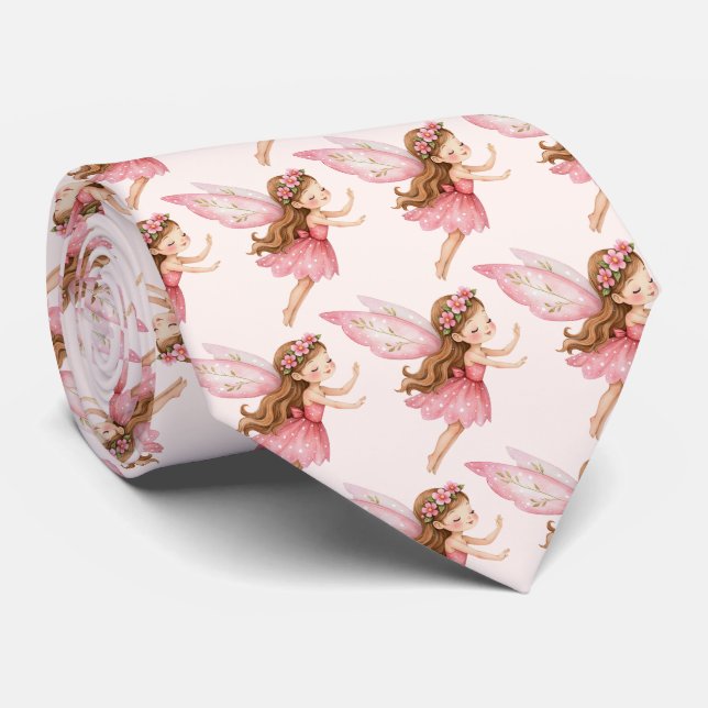 Söt sagoflicka i rosa klänning fantasifullt mönste slips (Rullad)