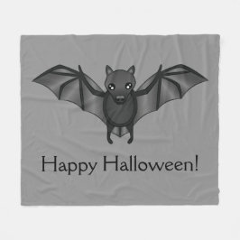 Söt seriefladdermus med glad halloween-text fleecefilt