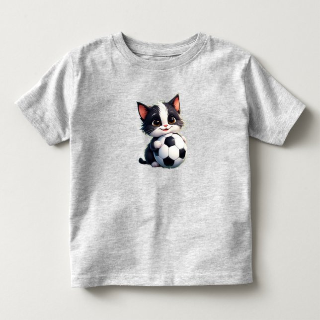 Söt serieteckning katt håller fotboll t shirt (Framsida)