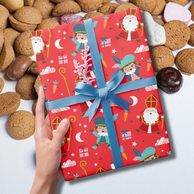 Söt Sinterklaas och Piet-mönster på röd Presentpapper (Skapare uppladdad)