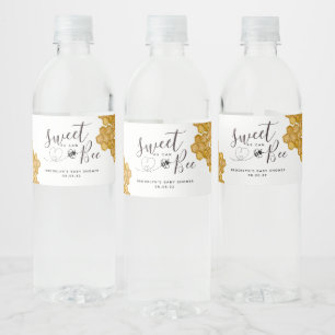 Söt som kan vara babyskor vattenflaskor etikett