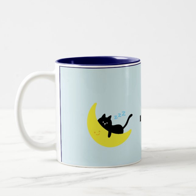Söt sovande svart katt på månen Pastellblå kaffe Två-Tonad Mugg (Vänster)