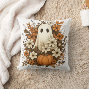 Söt spökfigur med pumpa och höstblommor – Hallowee Kudde