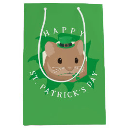 Söt St. Patricks dag-hamster som tittar genom hål