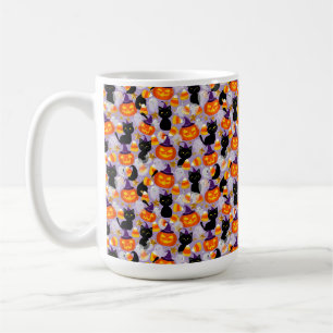 Söt svart katt, pumpor och majskorn kaffemugg