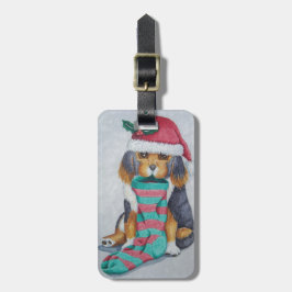 Söt svart och brun marionett, klädd till julklump bagagebricka