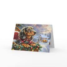 Söt svart och tan dachshund jul