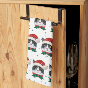 Söt svart och vit katt med tomteluva jul kökshandduk