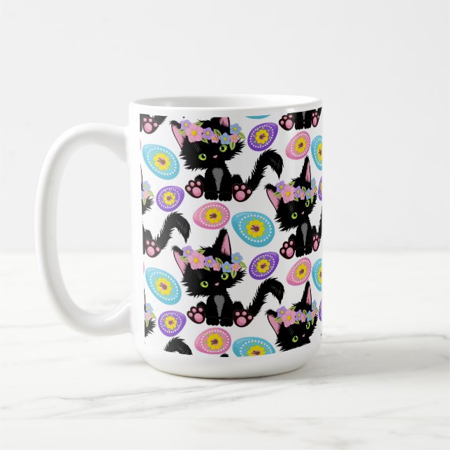 SÖT SVART PÅSKKATT MED PÅSKÄGG KAFFEMUGG (Vänster)