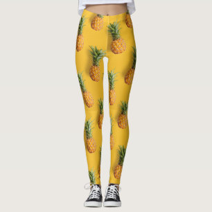 Söt tastisk ananas på djupa gultens bakgrund leggings