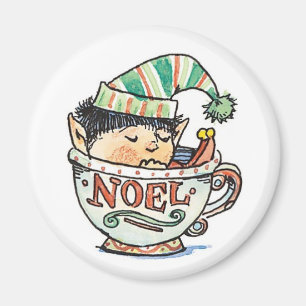 Söt tecknad jul-tomte sover i en tekopp magnet