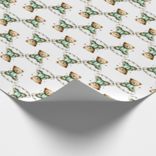 Söt teddybjörn på en fluffig moln gröna pyjamas presentpapper