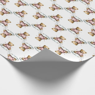 Söt teddybjörn på en fluffig moln rosa pyjamas presentpapper