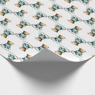 Söt teddybjörn på en fluffig molntjej i blå pyjama presentpapper