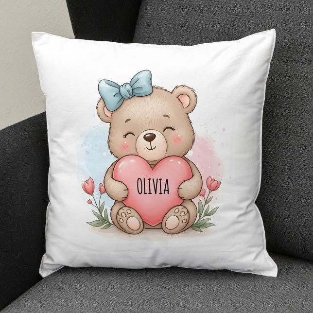 Söt teddybjörn som håller rosa hjärta kudde (Skapare uppladdad)