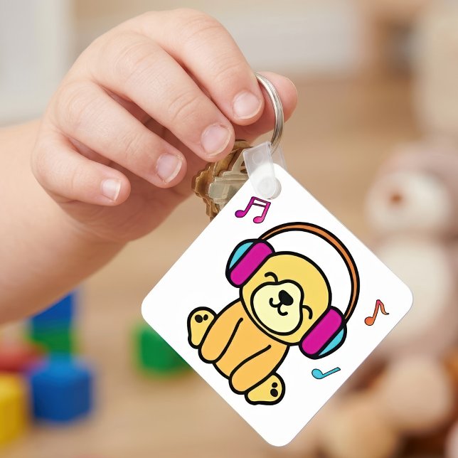 Söt valp ler med färgglada hörlurar nyckelring (Kawaii Dog Puppy Smiling with Colorful Headphones. Keychain)