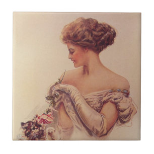 Söt Woman Holding a Kitten (av Harrison Fisher) Kakelplatta