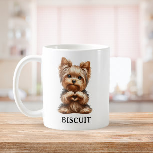 Söt Yorkie-hund som formar ett hjärta med tassarna Kaffemugg