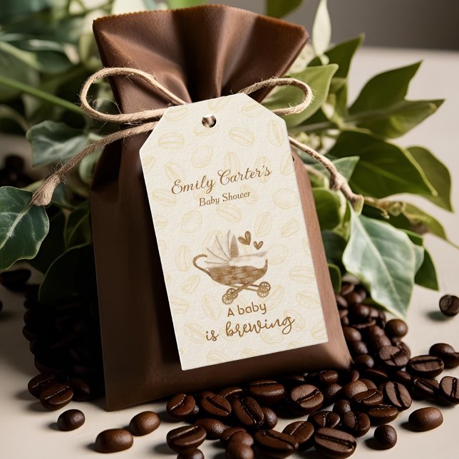 Söta barnvagnsbarn har en babyfest på gång presentetikett (Skapare uppladdad)