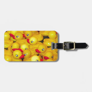 Söta gula gummiankor bagagebricka