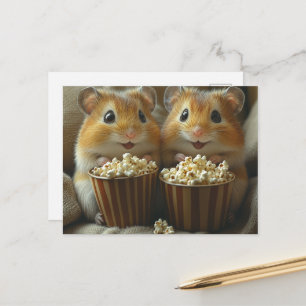 Söta hamstrar med popcorn för filmkväll vykort
