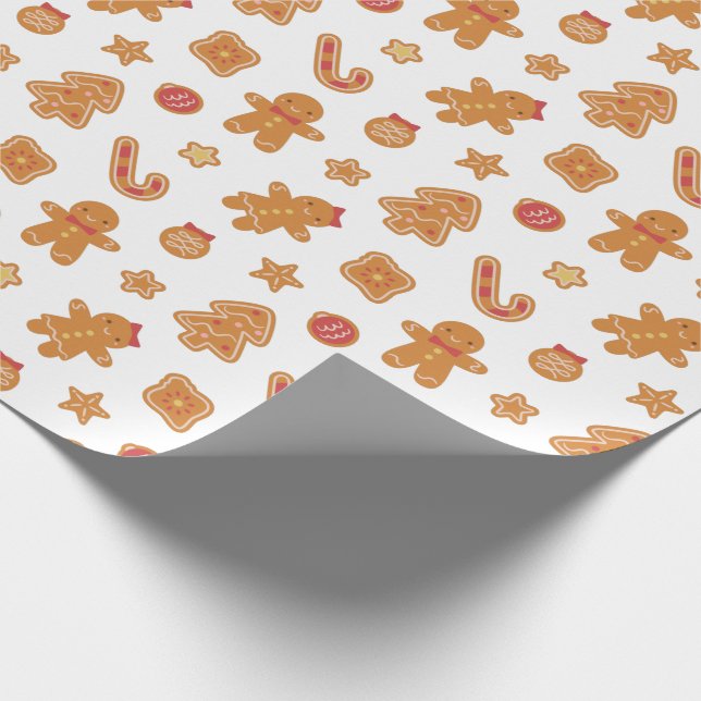 Söta julpepparkakor i form av gingerbread man möns presentpapper (Hörn)