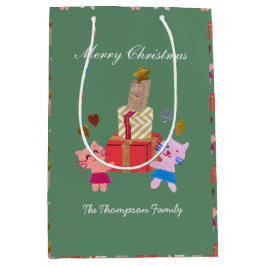 Söta katter med nuvarande grönt jul