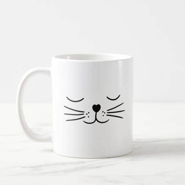 Söta kattögon sover kaffemugg (Vänster)