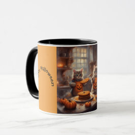 Söta kattungar i halloween-kostymer bakar kakor mugg