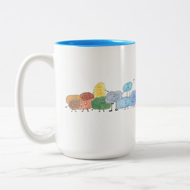 Söta luddiga varelser på en kaffekopp (Vänster)