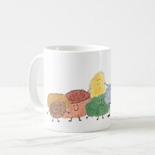 Söta luddiga varelser på en kaffemugg