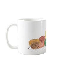 Söta luddiga varelser på en kaffemugg
