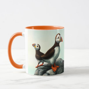 Söta lunnefåglar havsfåglar på klipporna mugg
