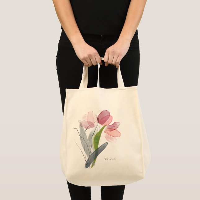 Söta rosa flickiga blommor av tulpaner med gröna b tygkasse (Framsida (produkt))