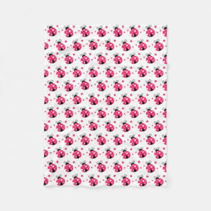 Söta rosa nyckelpigor och blommor fleecefilt