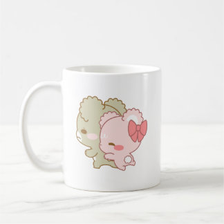 Söta sockerhakar av unge kaffemugg