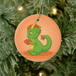 Sött Babydrake som håller kopp på orange Julgransprydnad Keramik
