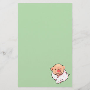 Sött babysvin insvept i filt brevpapper