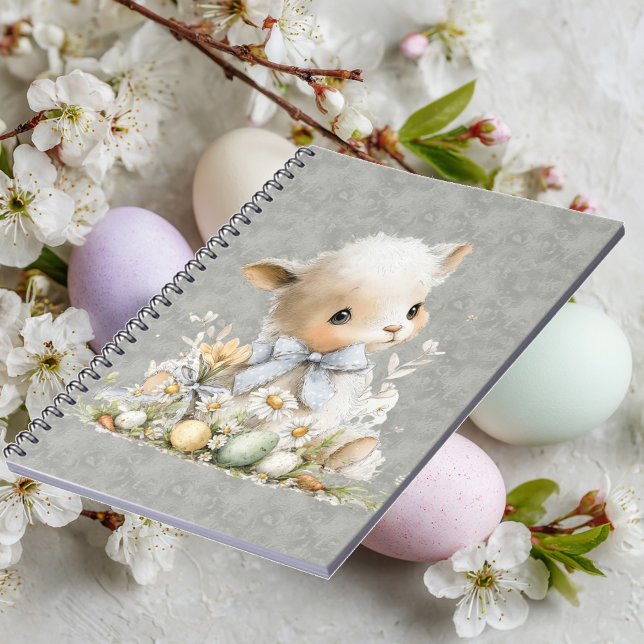 sött får i en äng med blommor och påskägg anteckningsbok (Skapare uppladdad)