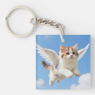 Sött flygande kattunge Kalico Tabby Blå himmel