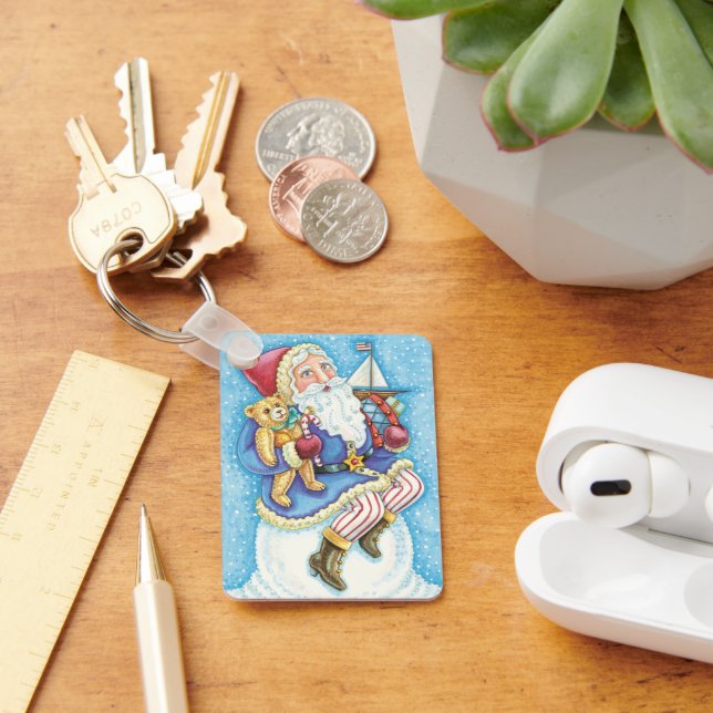 Sött jul, tomte på snöboll med leksaker nyckelring (Skrivbord)